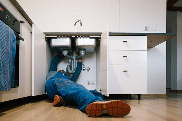 Professional Plumbing technician working in Denham Springs, LA